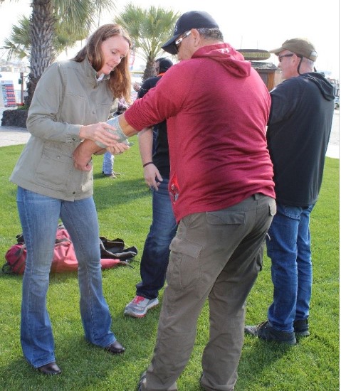 Kate Flanigan Sawyer M.D. practices wrapping a student’s arm during the 2019 MIL Train-the-Trainer Training in San Diego, CA. March 8, 2019. Photo: BIA
