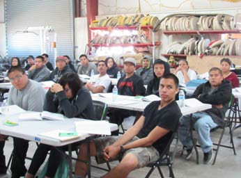New Firefighters at San Carlos prepare to complete applications during a 2017 job fair. New Firefighters at San Carlos prepare to complete applications during a 2017 job fair.