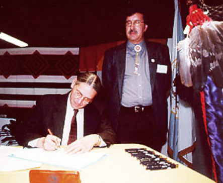 Assistant Secretary Indian Affairs Kevin Gover signs the first Government-to-Government Consultation Policy agreement
