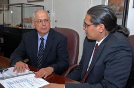 Interior Assistant Secretary-Indian Affairs Larry Echo Hawk (left) confers with his advisor Wizipan Garriott on efforts to address Indian Country’s social and economic issues
