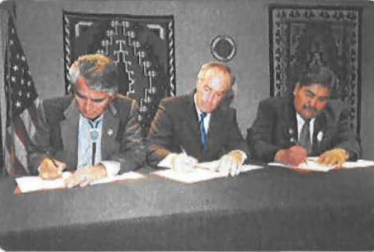 Signing the historic Navajo-Hopi Intergovernmental Compact