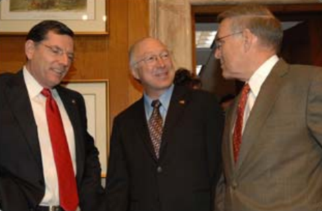 Secretary of the Interior Ken Salazar, center, confers with Senate Indian Affairs Committee Chairman