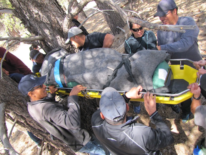 BIA Wilderness First Responders learn how to perform extended patient transports during a wilderness first responder class. BIA Photo by Michelle Moore, Program Coordinator BIA Wilderness First Responders learn how to perform extended patient transports during a wilderness first responder class. BIA Photo by Michelle Moore, Program Coordinator