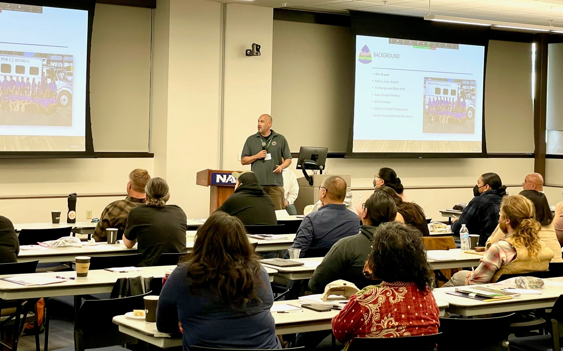 Aaron Baldwin, BIA Wildland Fire Management Fire Director, presents career opportunities to student attendees at a Tribal fire/forestry student summit in Flagstaff, AZ. Aaron Baldwin, BIA Wildland Fire Management Fire Director, presents career opportunities to student attendees at a Tribal fire/forestry student summit in Flagstaff, AZ.
