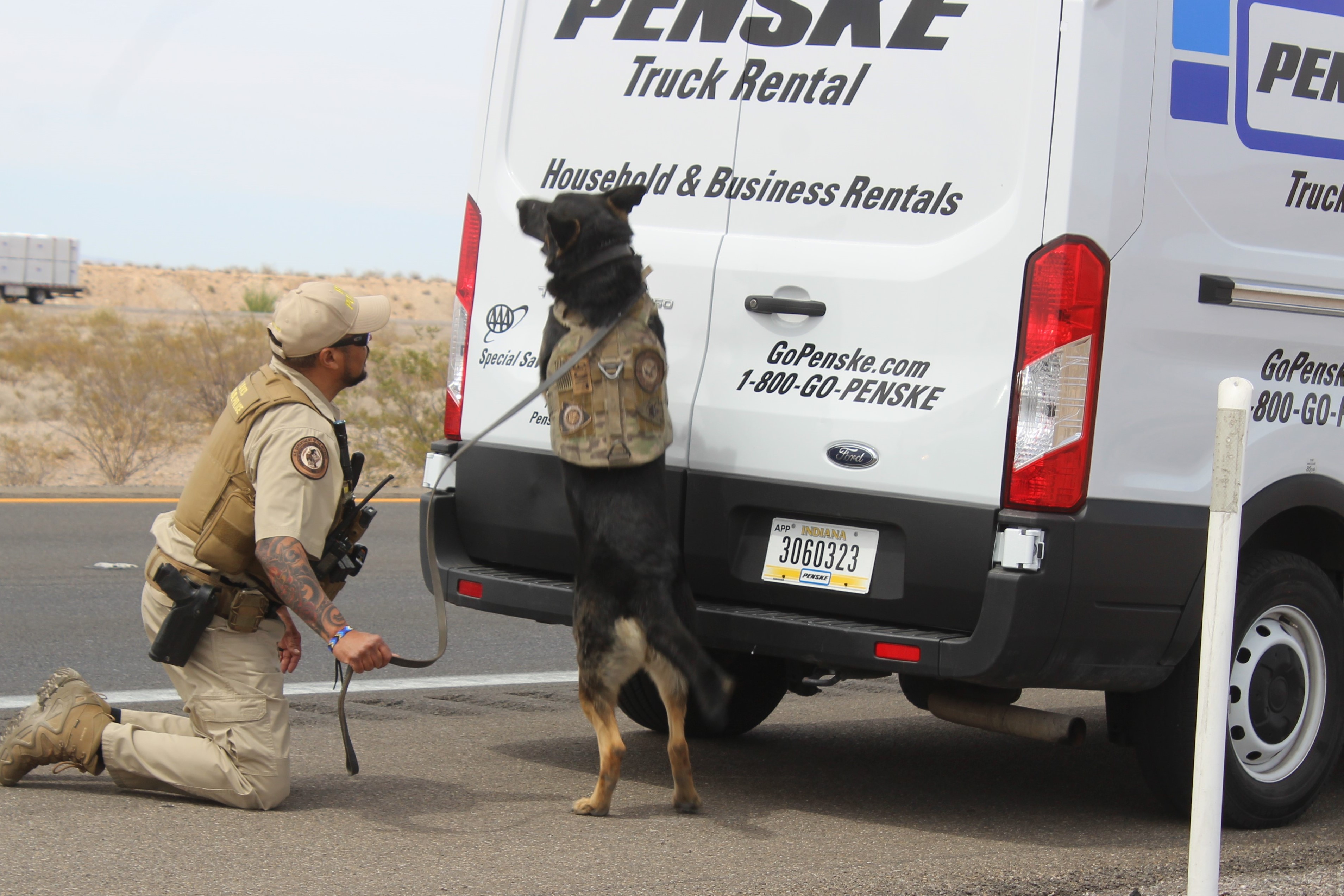 : “A Bureau of Indian Affairs K-9 officer and partner conduct an outside search of a rental truck on May 9, 2022, during a multi-agency criminal interdiction operation along I-15 within the Moapa River Indian Reservation in Nevada.”