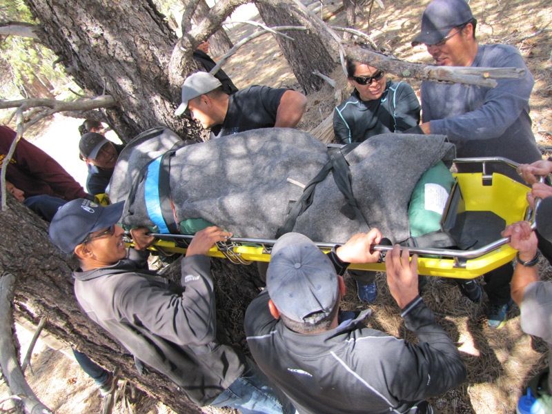 BIA Wilderness First Responders learn how to perform extended patient transports during a wilderness first responder class. BIA Photo by Michelle Moore, Program Coordinator