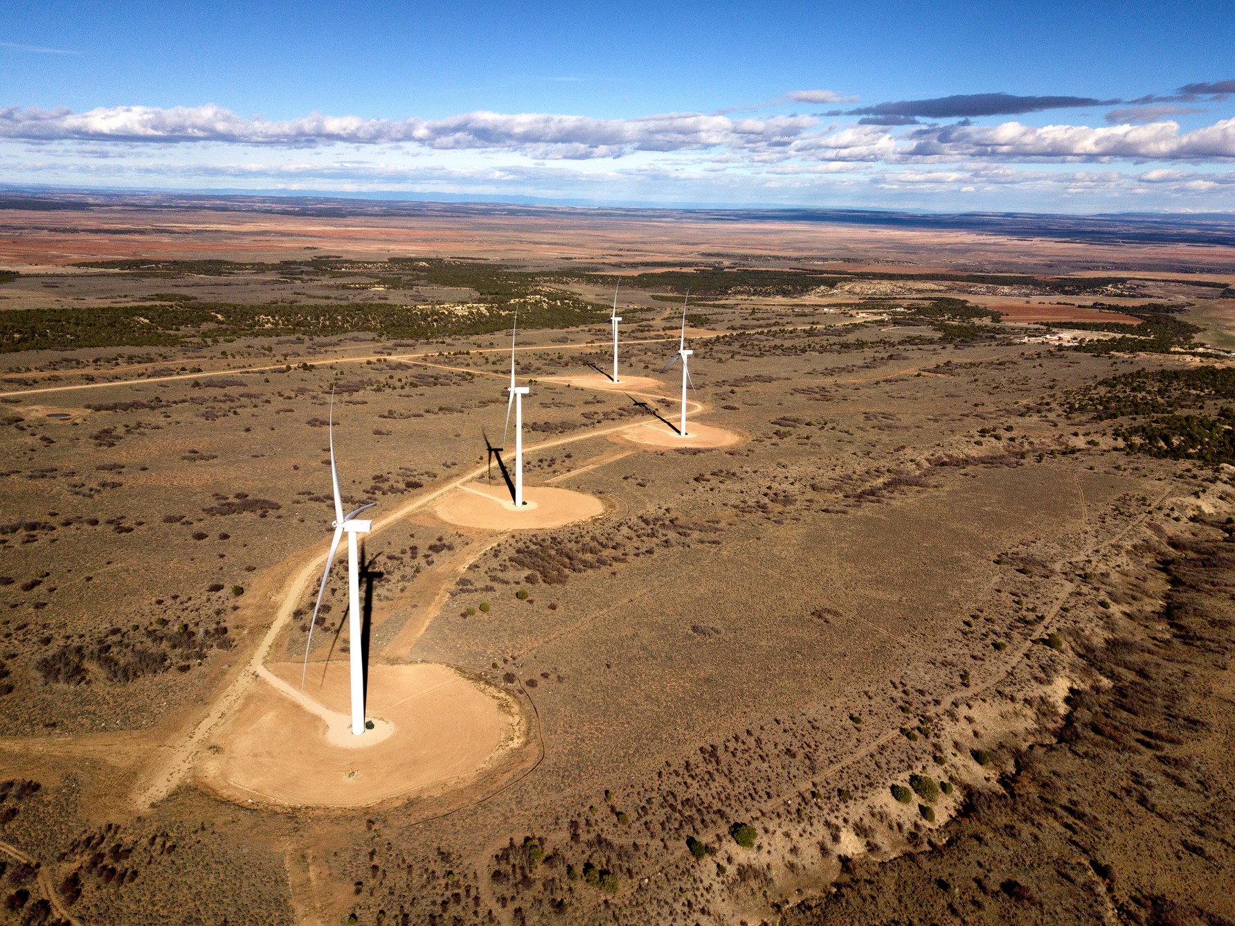 Remote location with large wind turbines in the Southwest supporting Native American energy