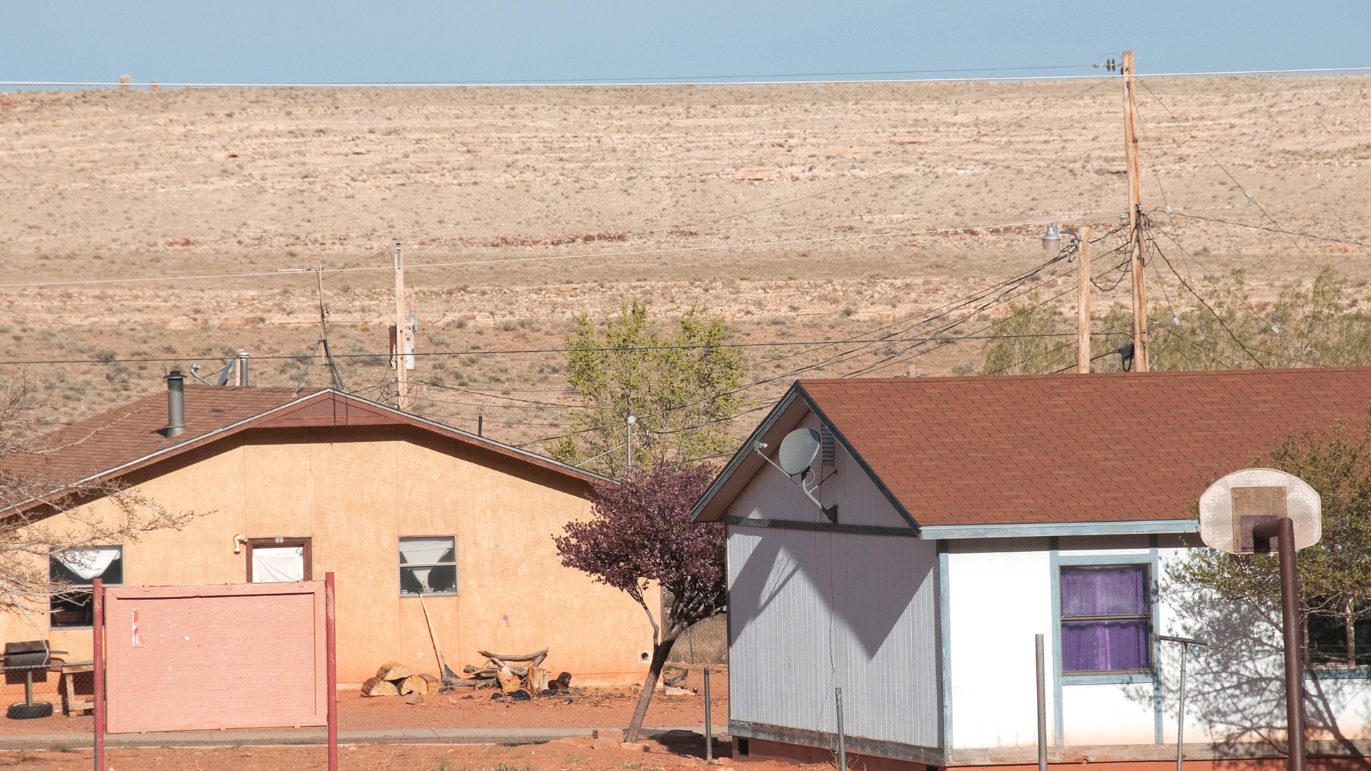 A photo of Tribal housing with access to electricity on Navajo Nation. 