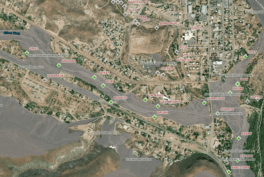 Image from the Fuel Treatment Effectiveness Monitoring reporting system shows San Carlos and Peridot, Arizona. Gray polygons are fuel reduction treatments, green icons represent areas that encountered a fuel treatment and gray fire icons are wildfires that did not encounter a fuel treatment. Image by: BIA
