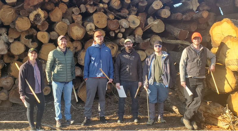 Timber Team working timber trespass area outside Okemah, OK, 2021. Hilary Chittom, Jason Roberts, Ryan Frandino, Garrett McFall, Wesley Staats, and Connor Eckhout are pictured from left to right.