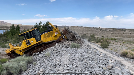 Dozer Crossing the Fuse Plug