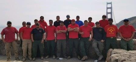 Mescalero Type 2 Initial Attack Crew pose with Golden Gate Bridge in Background. Crew supported the Mendocino Lake Complex Fire in California, Oct. 2017