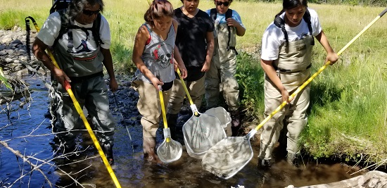 Students participating in 2018 Tribal Salmon Camp by river
