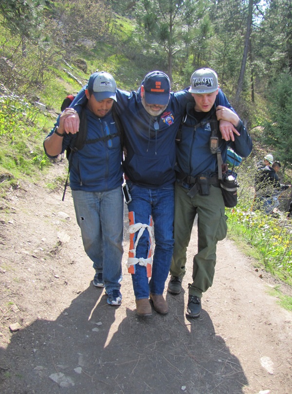 Wilderness First Responder students transport a stable patient during a WFR training simulation. BIA Photo by Michelle Moore, Program Coordinator