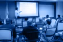 Blurred photo of someone presenting