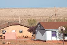 A photo of Tribal housing with access to electricity on Navajo Nation. 