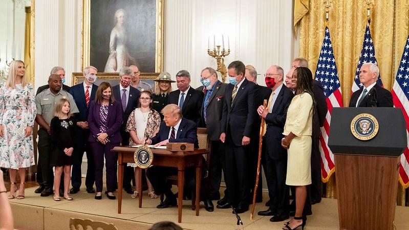 President Donald J. Trump signs H.R. 1957- The Great American Outdoors Act Tuesday, August 4, 2020, in the East Room of the White House. (Official White House Photo by D. Myles Cullen)