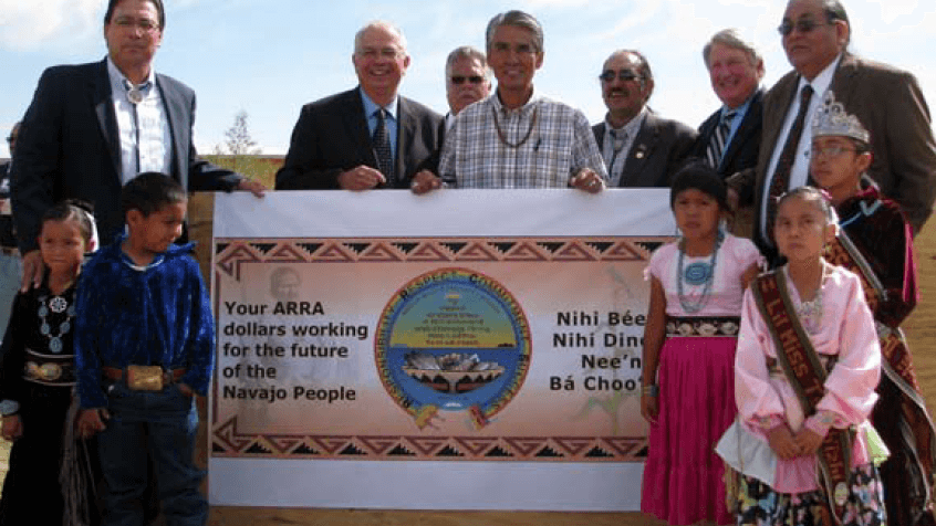 Officials from the Interior Department, Navajo Nation and Rough Rock Community School with students from the school’s Navajo Language Immersion class.