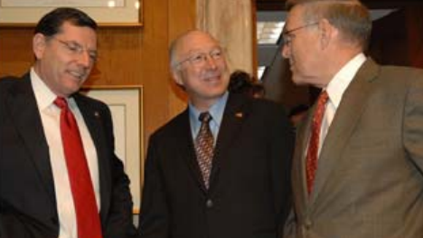 Secretary of the Interior Ken Salazar, center, confers with Senate Indian Affairs Committee Chairman