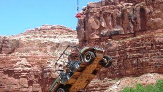 Navajo Region's A-star B-3 helicopter slings an ultra-terrain vehicle into the Supai Village, Grand Canyon, AZ.