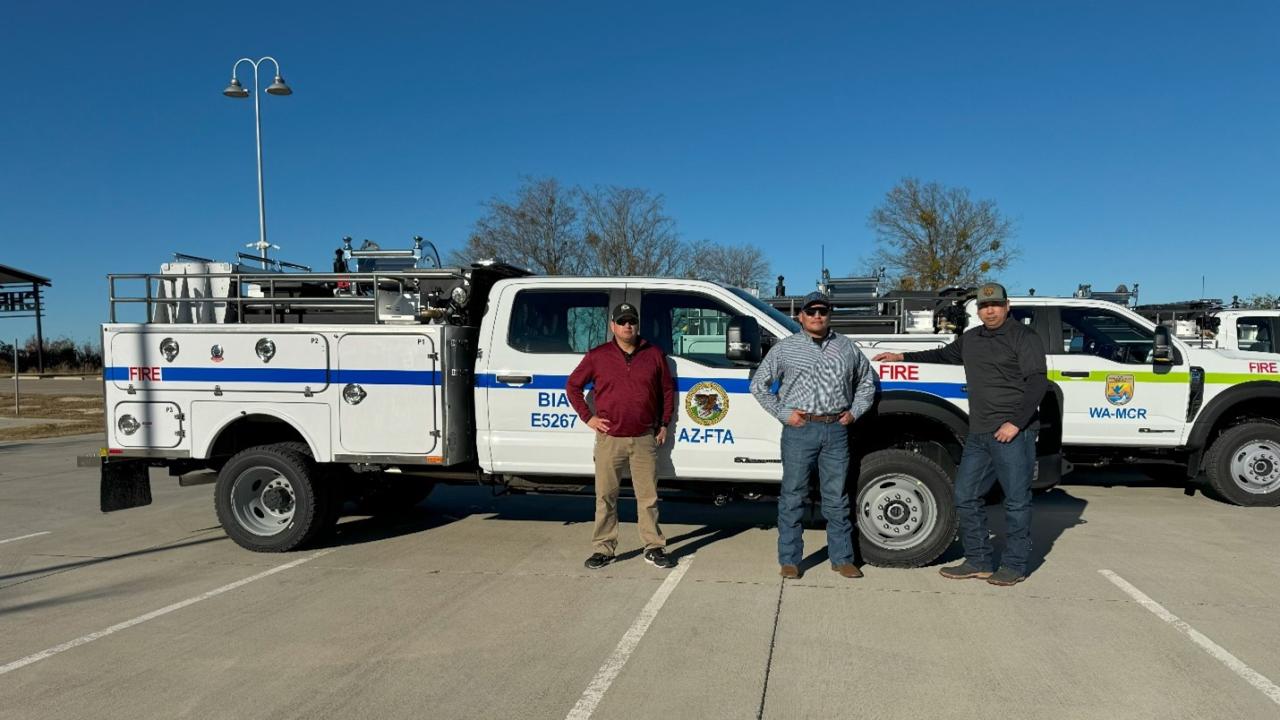 Bureau of Indian Affairs operations staff members, Bradford LeCompte, Joshua Simmons and Shane Santos, pictured in front of a newly inspected Model 662, Type 6 engine in Weatherford, TX, on December 12, 2024. Photo taken by Brian Williams, Bureau of Land Management.