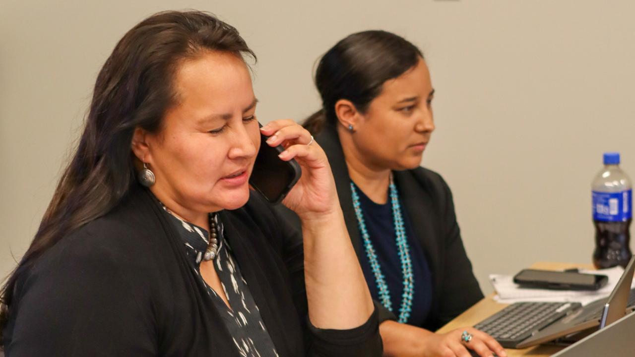 Two women working at computers using the new Electronic Probate System.