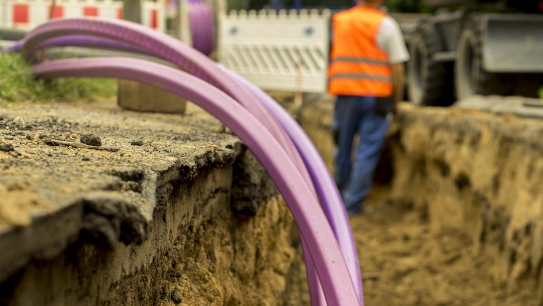 Fiber optic cables going into the ground