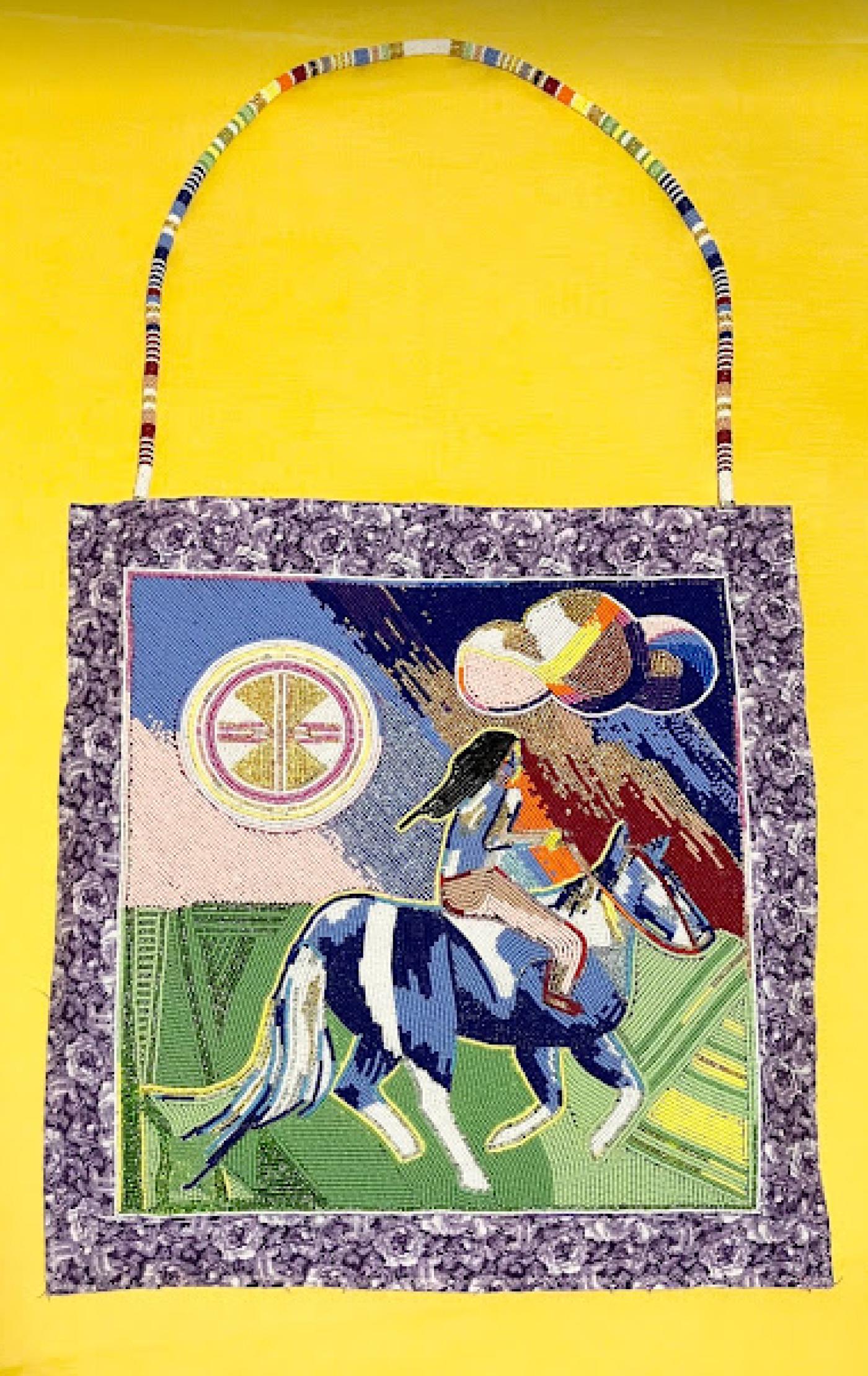 Beadwork purse of a person riding horseback across a green field.