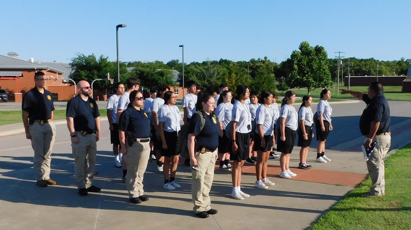A photo of the 2024 Youth Indian Police Academy lined up for instruction.