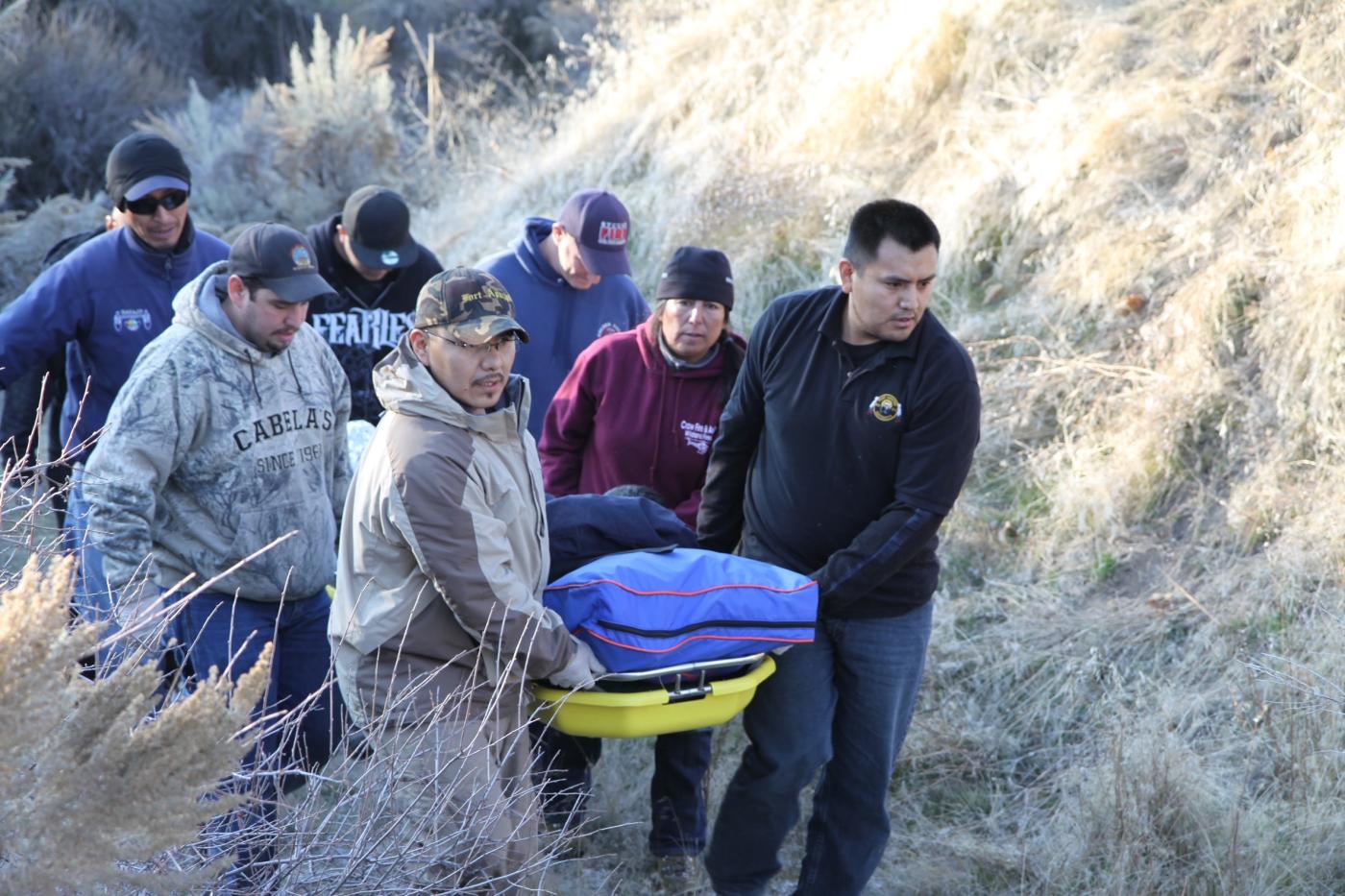 BIA Wildland Fire First Aid Program trainees perform group litter movement.