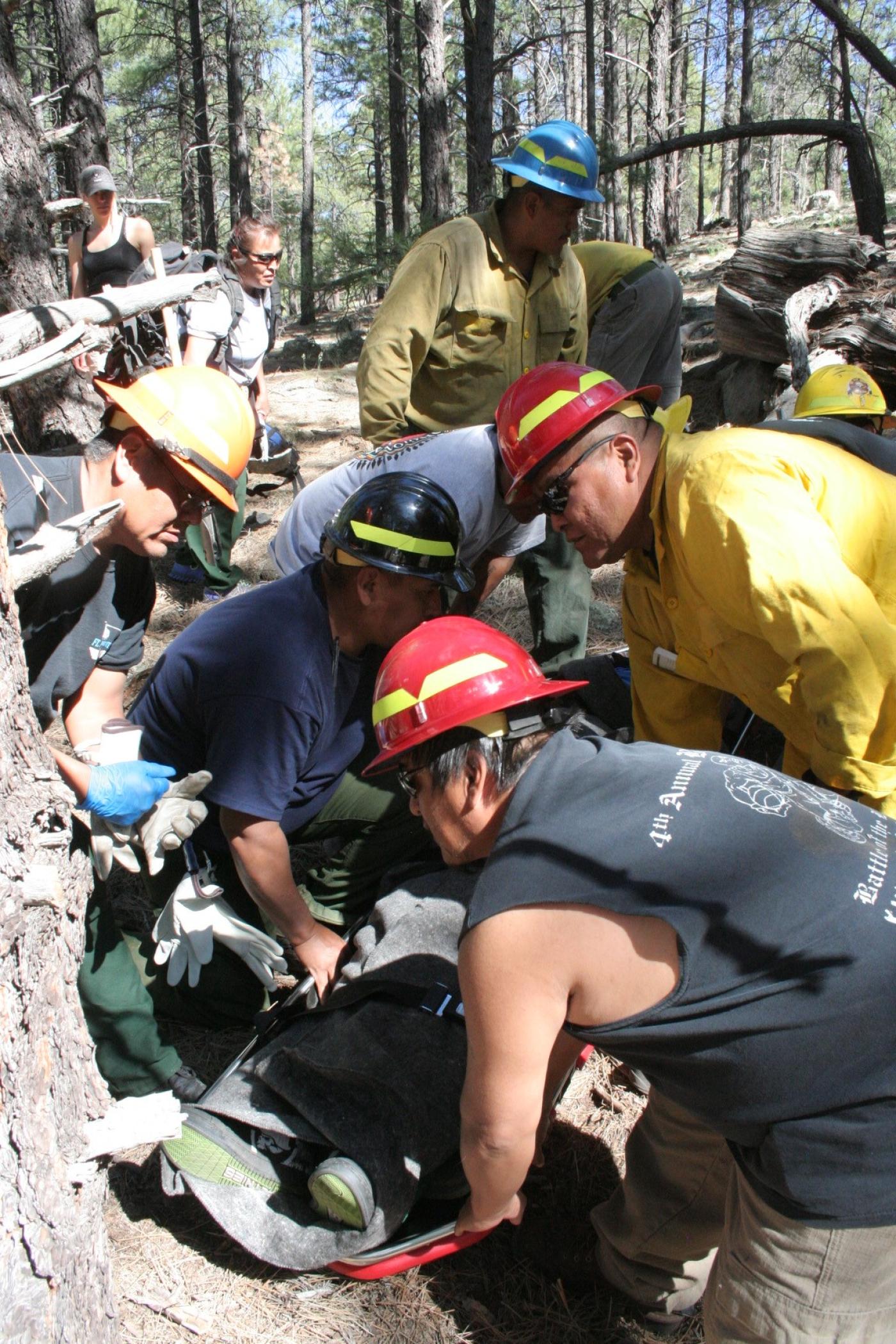BIA Wildland Fire First Aid Program trainees participate in a scenario-based exercise.